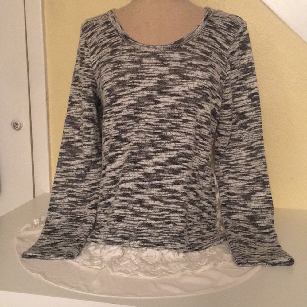 A long sleeve top by Karen Karen